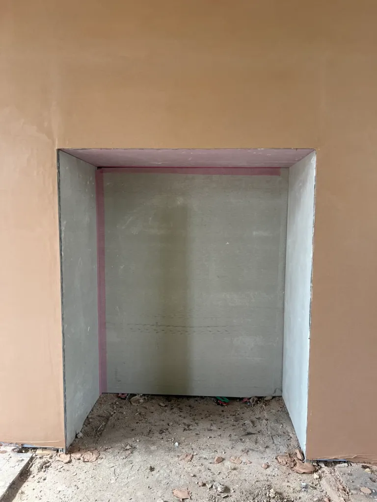Alcove with soundproofing installed around ready for soundproofing TV or cinema room